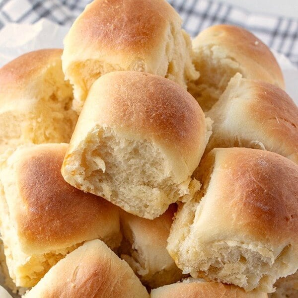 Soft and Easy Buttery Rolls piled in bowl close up.