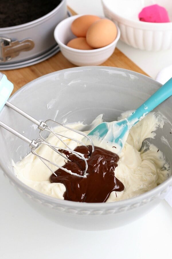 Chocolate Bliss Cheesecake ingredients in a mixing bowl