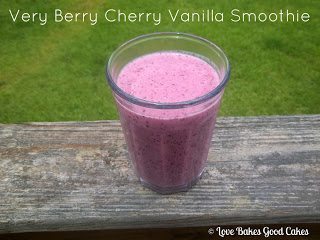 Very Berry Cherry Vanilla Smoothie in glass on wooden rail