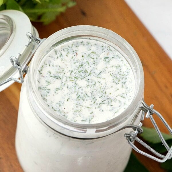 looking down into glass container with homemade ranch dressing