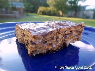 Indoor S'mores Bars on blue plate side view.