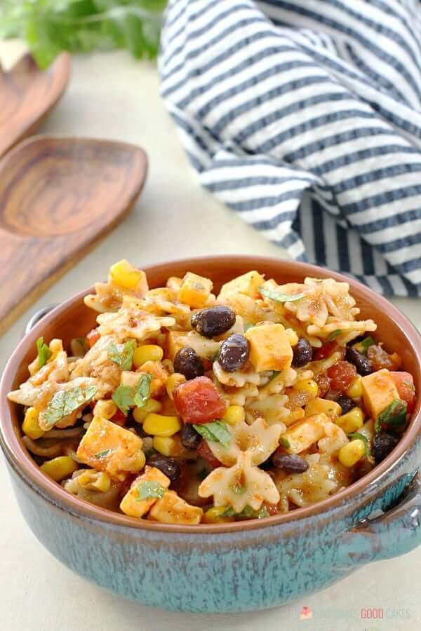 Taco Pasta Salad in bowl close up with spoon.