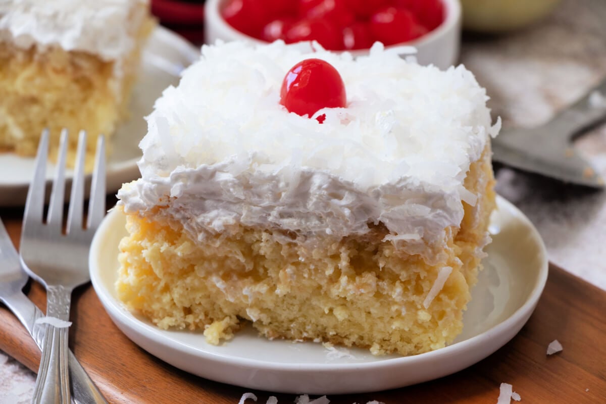 Piña Colada Poke Cake - Love Bakes Good Cakes