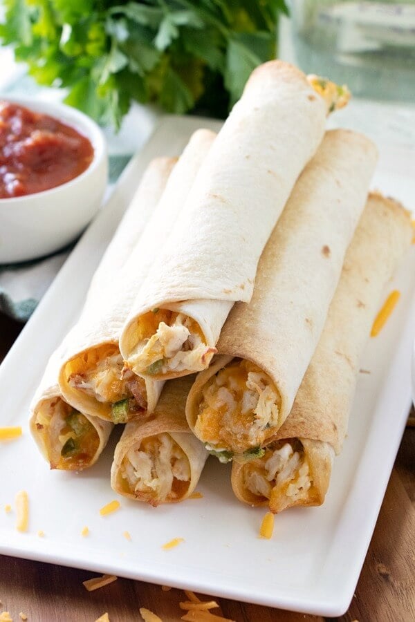 jalapeno popper chicken taquitos on plate
