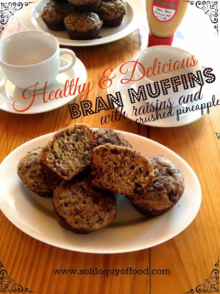 Healthy & Delicious Bran Muffins with Raisins & Crushed Pineapple on a plate with two cups.