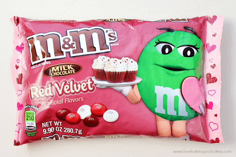 This show-stopping M&M's® Red Velvet Cookie Cake is perfect for Valentine's Day! This giant cookie is loaded with M&M's® Red Velvet chocolate candies and a from-scratch Red Velvet Buttercream Frosting! Perfect for sharing with a friend! #RedVelvetLove #ad