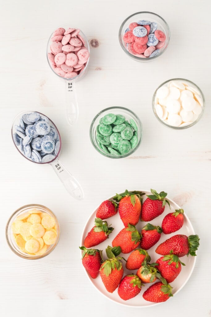 ingredients to make candy coated strawberries