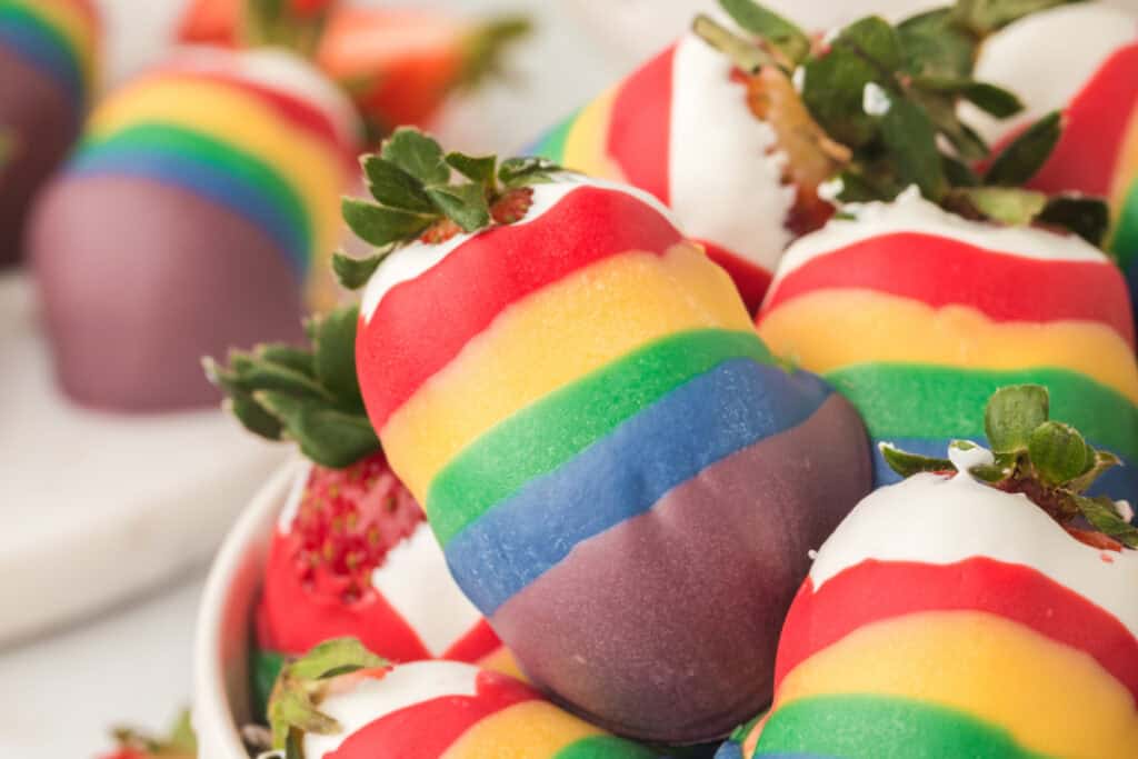 rainbow strawberries in a bowl