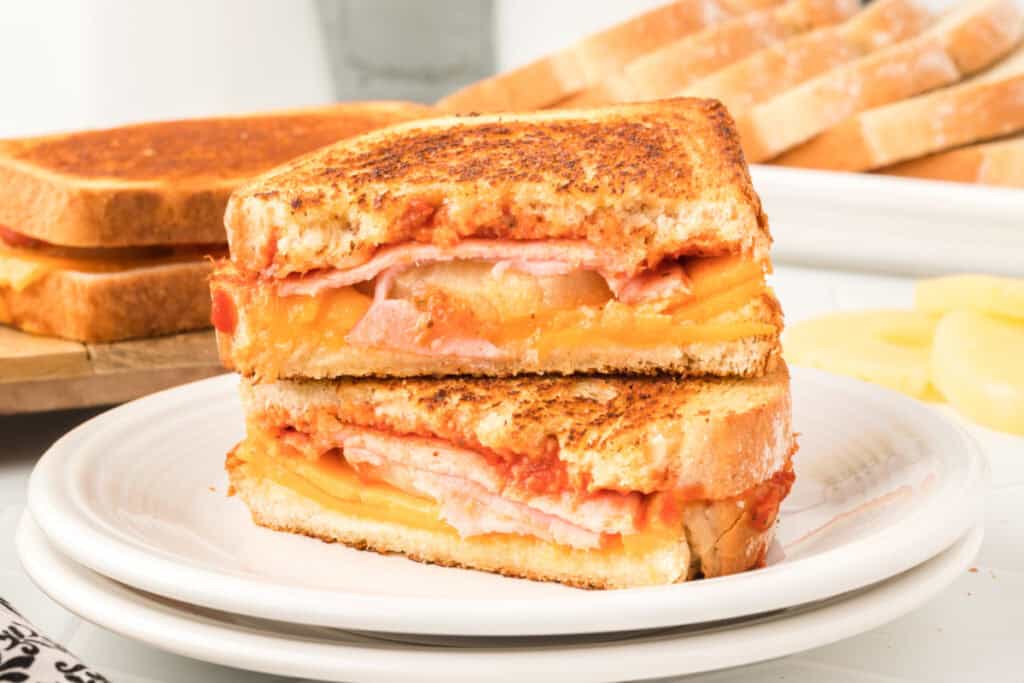 sliced Hawaiian Pizza Grilled Cheese on plate