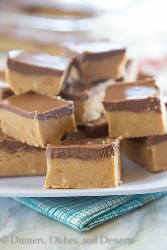 Reese’s Fudge squares stacked on a plate.