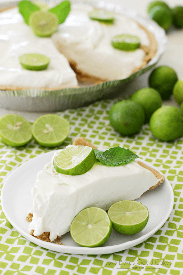 No-Bake Key Lime Pie on a plate with fresh limes.