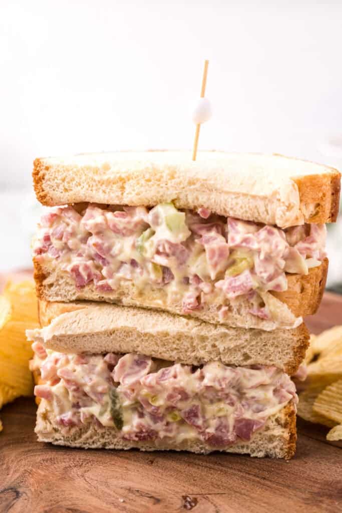 ham salad sandwich cut in half with the halves stacked