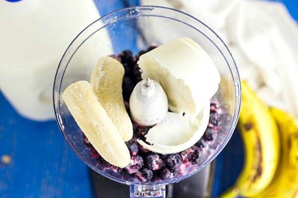 Blueberry Banana Smoothie Bowl ingredients in a blender.