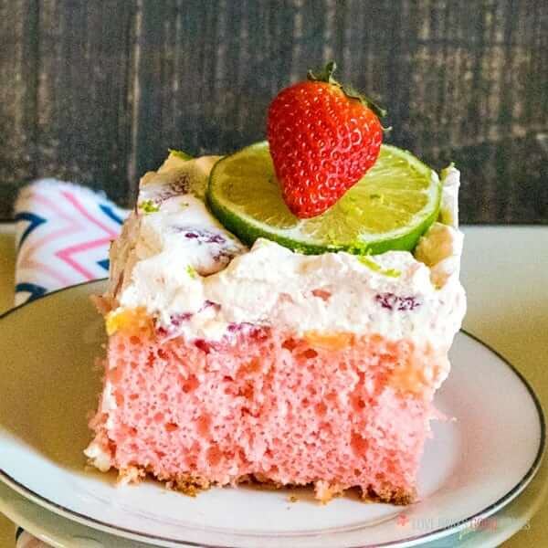 Boozy Strawberry Margarita Poke Cake - Love Bakes Good Cakes