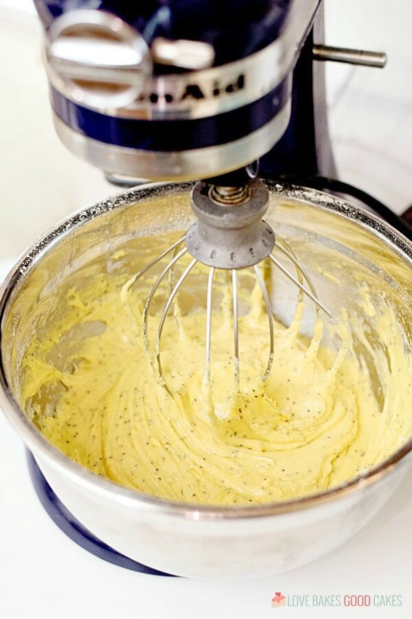 Lemon Poppy Seed Muffin ingredients being mixed up in a metal mixing bowl.