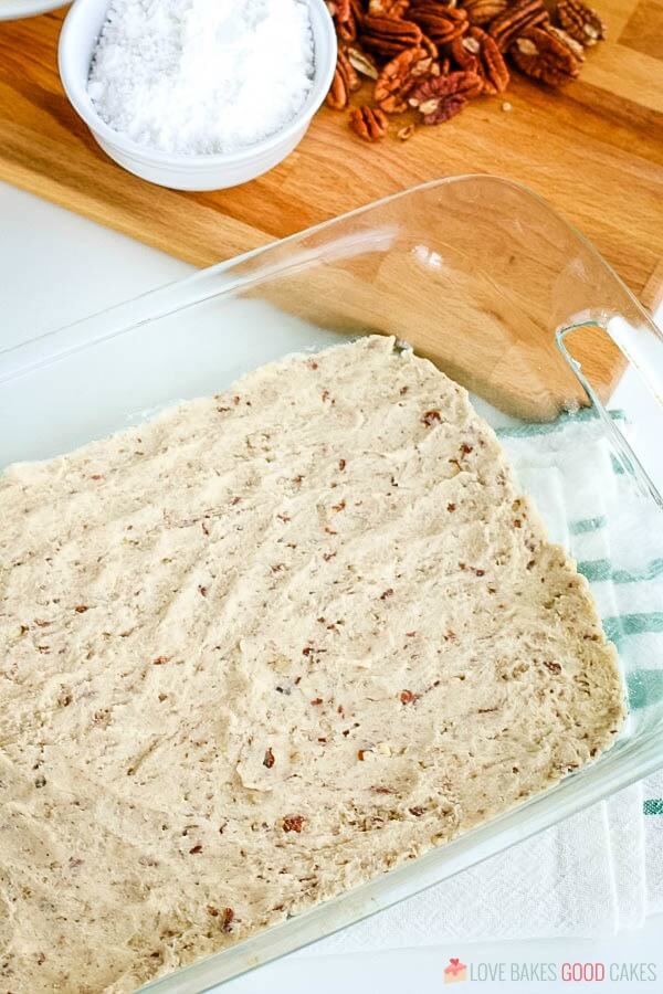 Putting the pie mix into a glass baking dish.