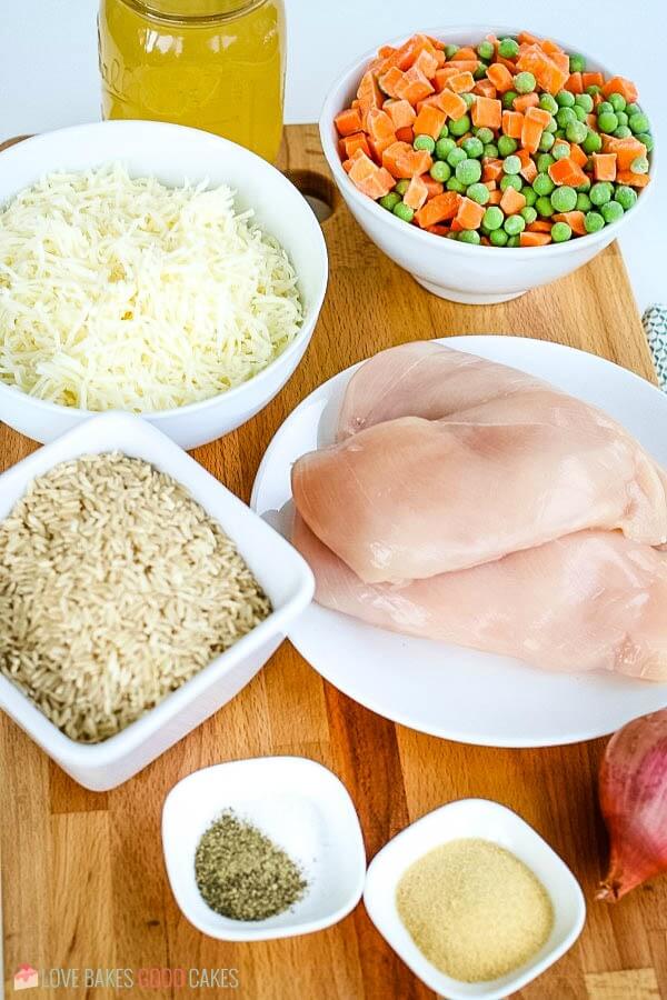 Ingredients to make a slow cooker chicken and rice recipe.
