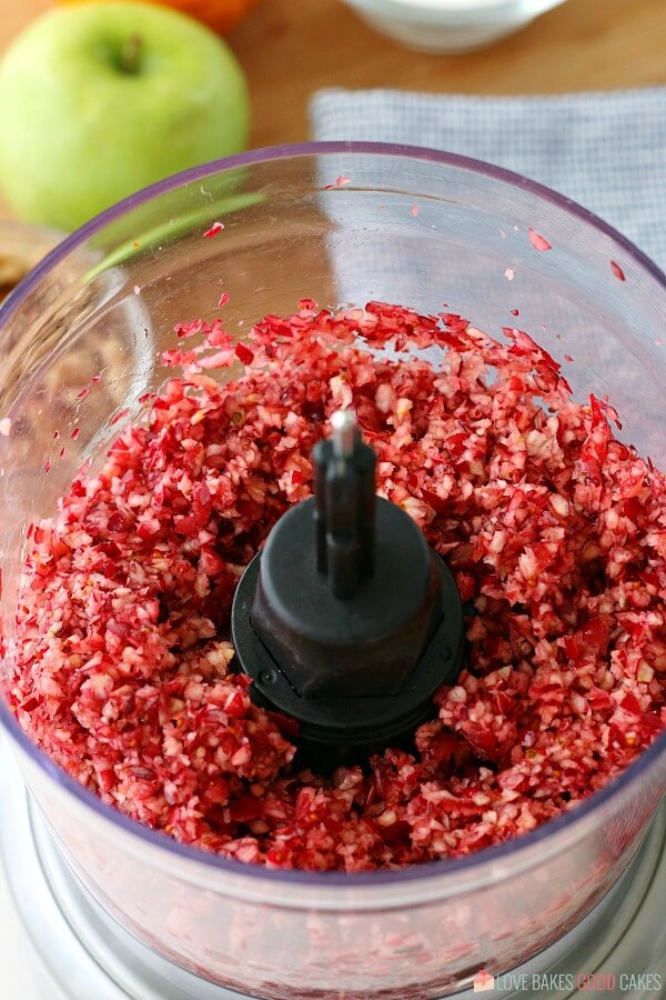 Here we see the ingredients for cranberry relish added to the food processor which makes the chopping easy! 