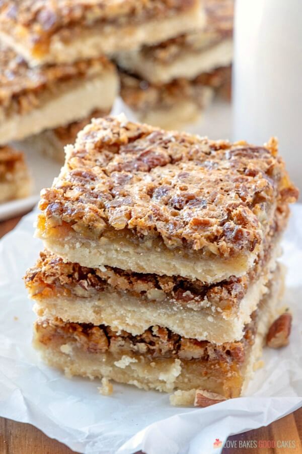 Skip the pie and make these Pecan Pie Bars! Shortbread topped with a gooey filling and crunchy pecans in an easy-to-eat with your hands' bar!