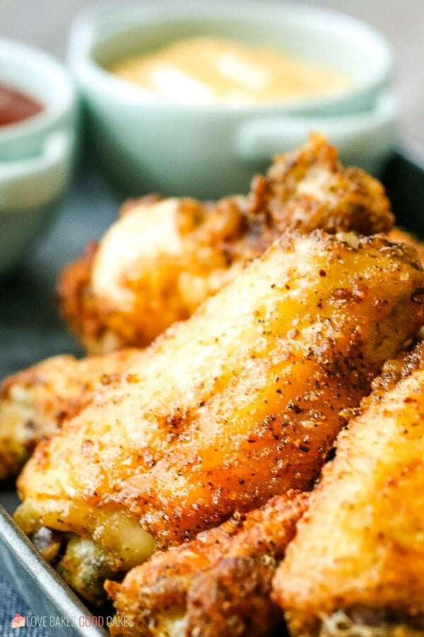 An up close shot of the air fryer chicken wings coated in seasonings after being cooked 