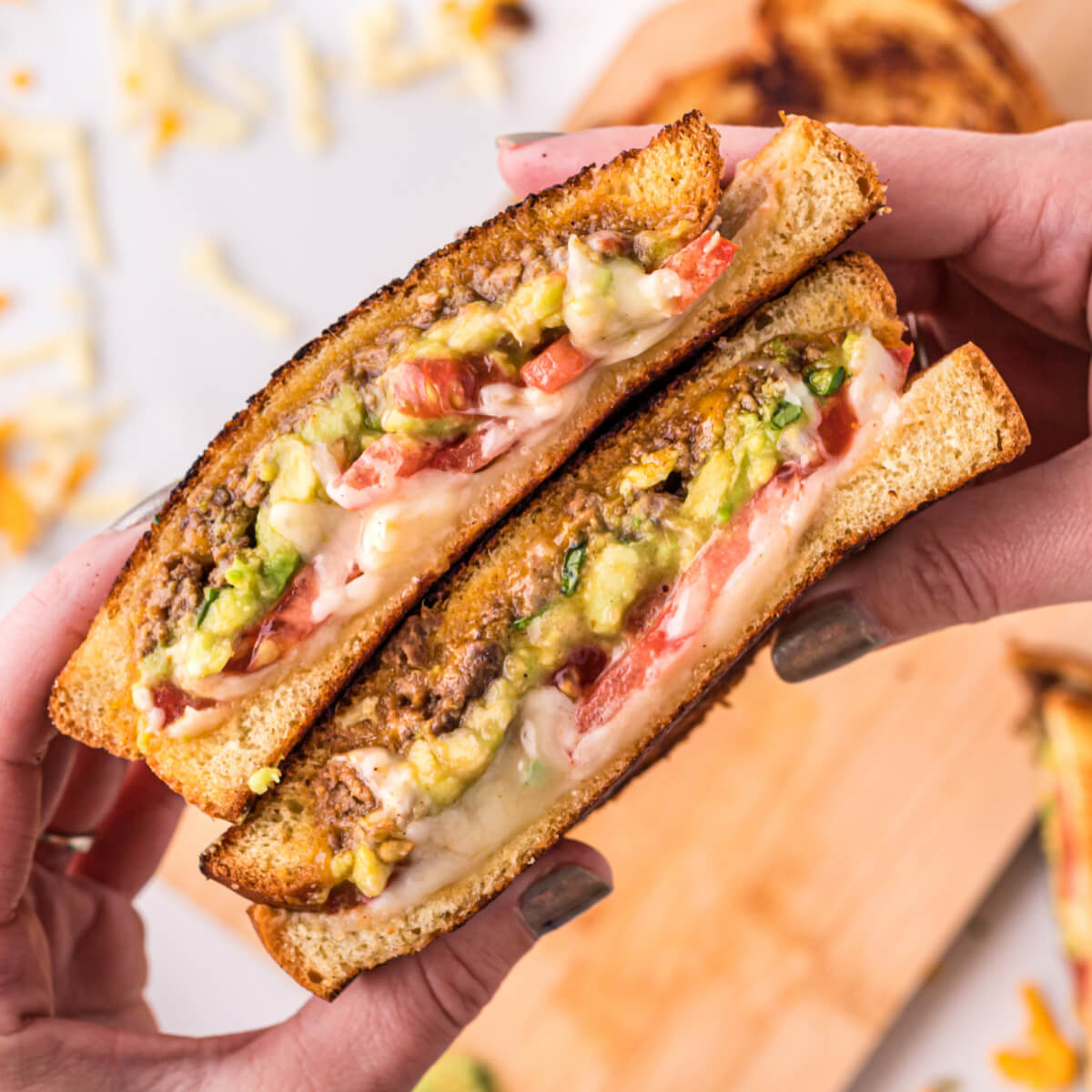 https://www.lovebakesgoodcakes.com/wp-content/uploads/2020/04/Taco-Stuffed-Grilled-Cheese-square.jpg