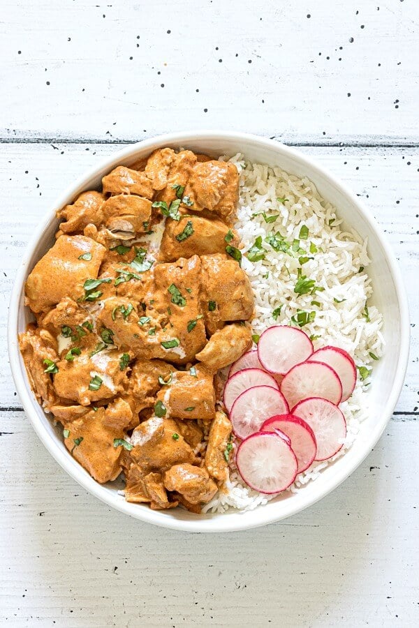 instant pot butter chicken in bowl with rice