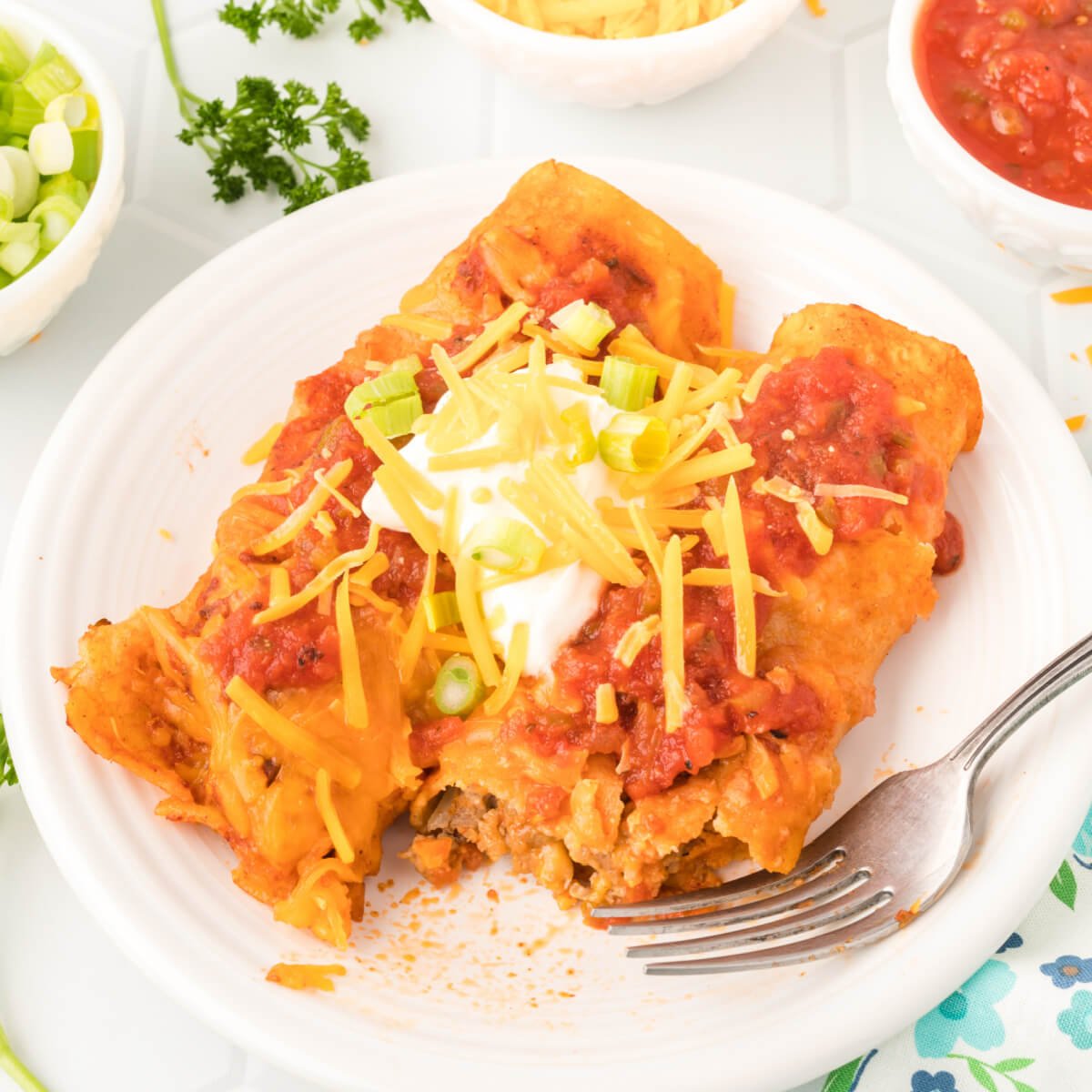 https://www.lovebakesgoodcakes.com/wp-content/uploads/2020/09/Ground-Beef-Enchiladas-square.jpg