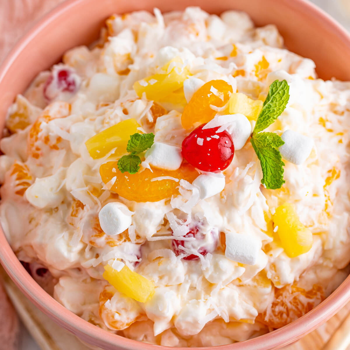 https://www.lovebakesgoodcakes.com/wp-content/uploads/2023/07/Ambrosia-Salad-square.jpg