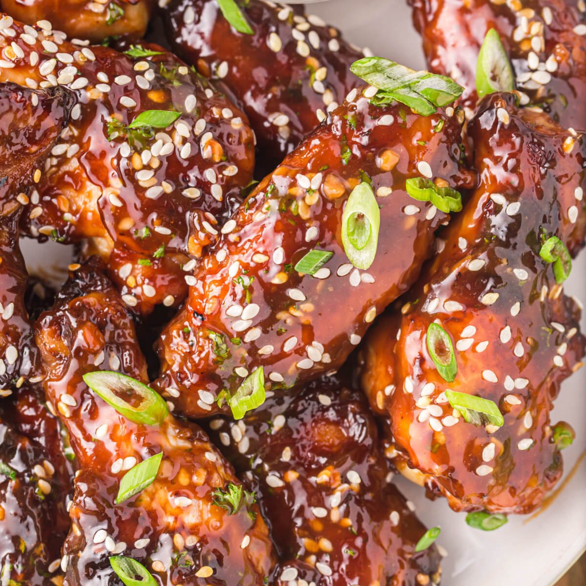 https://www.lovebakesgoodcakes.com/wp-content/uploads/2023/12/Air-Fryer-Chicken-Teriyaki-Wings-square.jpg