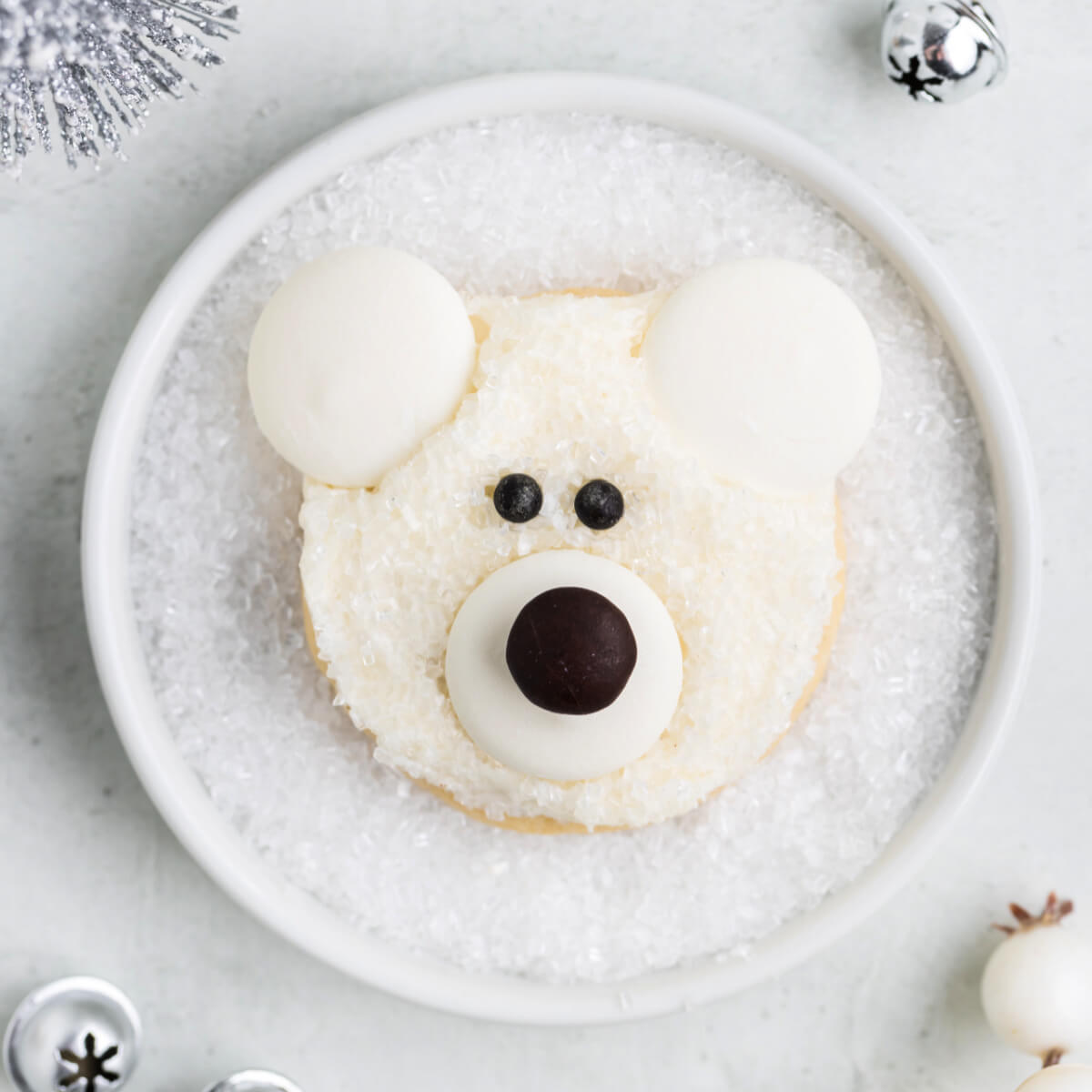 https://www.lovebakesgoodcakes.com/wp-content/uploads/2023/12/Polar-Bear-Face-Cookies-square.jpg