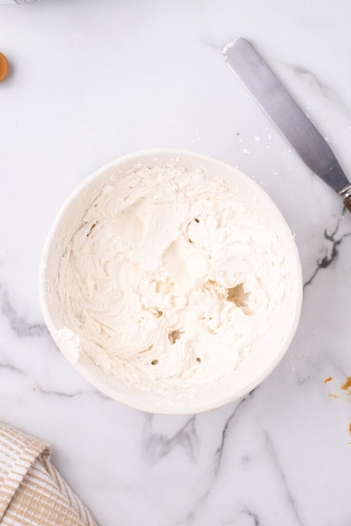 cream cheese frosting in mixing bowl