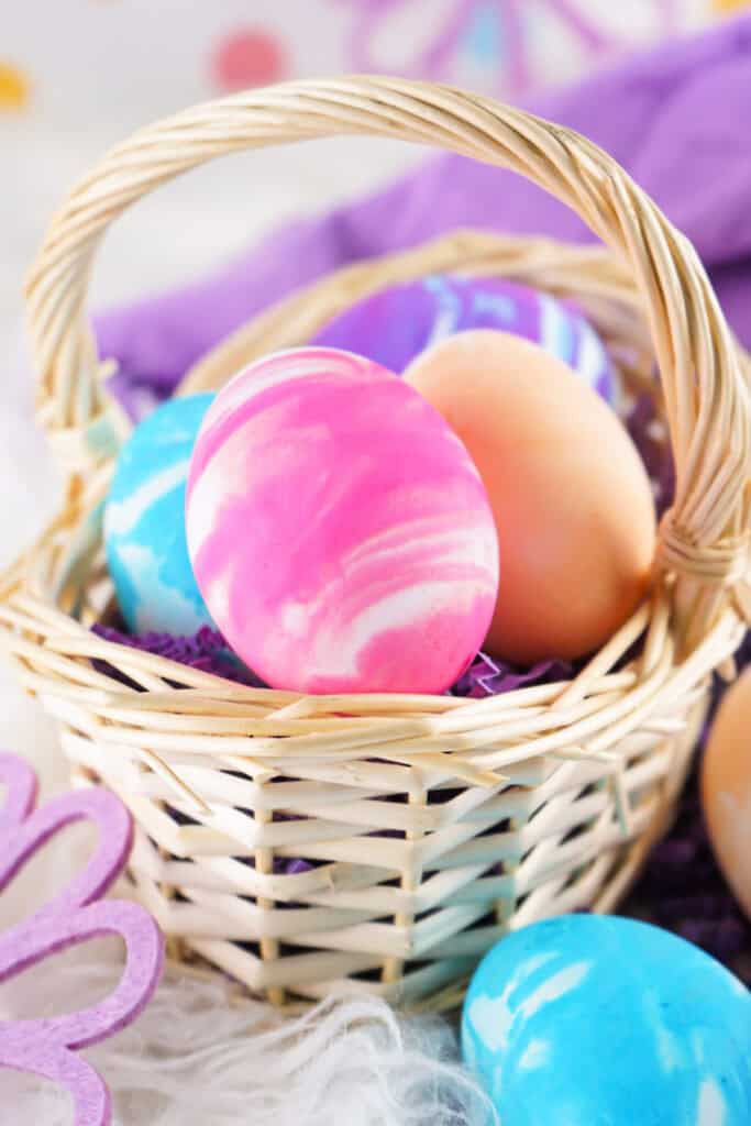 cool whip dyed easter eggs in brown basket