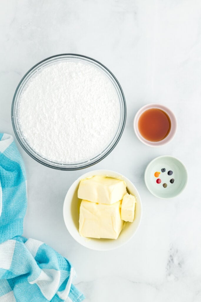 ingredients to make frosting for rainbow striped funfetti cake