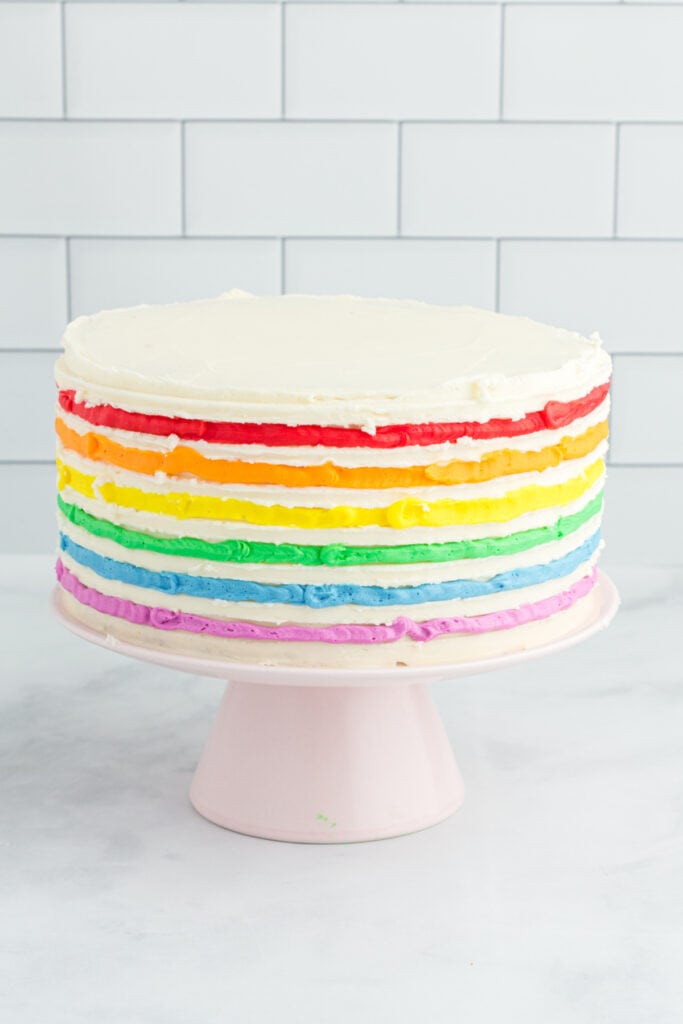 rainbow funfetti cake on cake stand