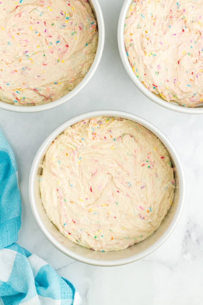 funfetti cake batter in pan before being baked